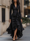 Navy blue FJØRNA satin maxi dress with draped design and ruffle details, elegant and flowing for formal occasions.