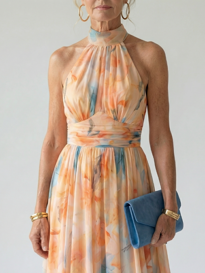 FJØRNA women's summer midi dress with halter neck, sleeveless, flowy, lightweight fabric, perfect for warm weather.