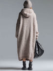 Grey knit floral midi dress for women by FJØRNA, featuring a fitted bodice and flowing skirt with floral pattern.