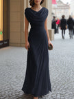 FJØRNA black draped cowl-neck ruched maxi dress showcasing flowing fabric and elegant design, perfect for formal occasions.