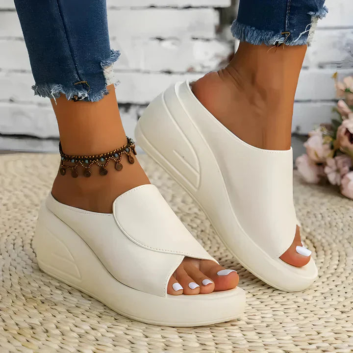 FJØRNA women's orthopedic slip-on shoes with wedge heel, comfortable and stylish for everyday wear, in neutral colors