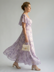 FJØRNA women's summer midi dress with floral print, square neckline, and flutter sleeves, perfect for warm-weather style.