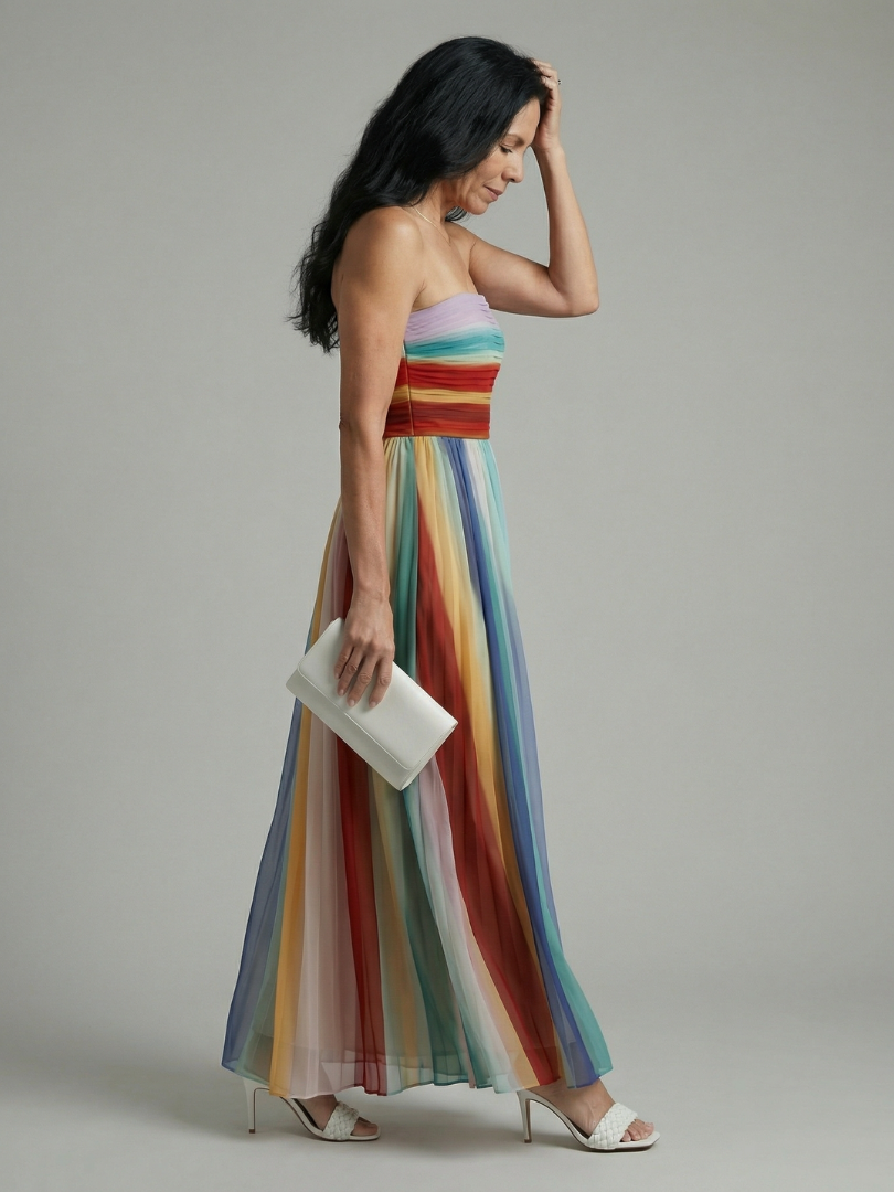 FJØRNA women's summer maxi dress with bold striped pattern, strapless design, flowing fabric, ideal for warm weather and casual wear.
