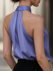 Lavender satin cross-neck sleeveless blouse for women by FJØRNA, featuring a stylish and elegant design perfect for casual or dressy wear.