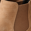 FJØRNA black slip-on Chelsea boots for men, stylish leather shoes with elastic side panels and sleek design.