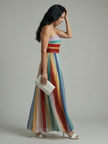 FJØRNA women's summer maxi dress with striped strapless design and pleated fabric, flowing and stylish for warm weather.