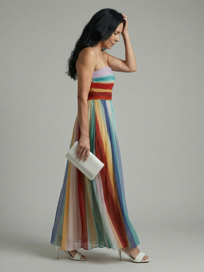 FJØRNA women's summer maxi dress with striped strapless design and pleated fabric, flowing and stylish for warm weather.