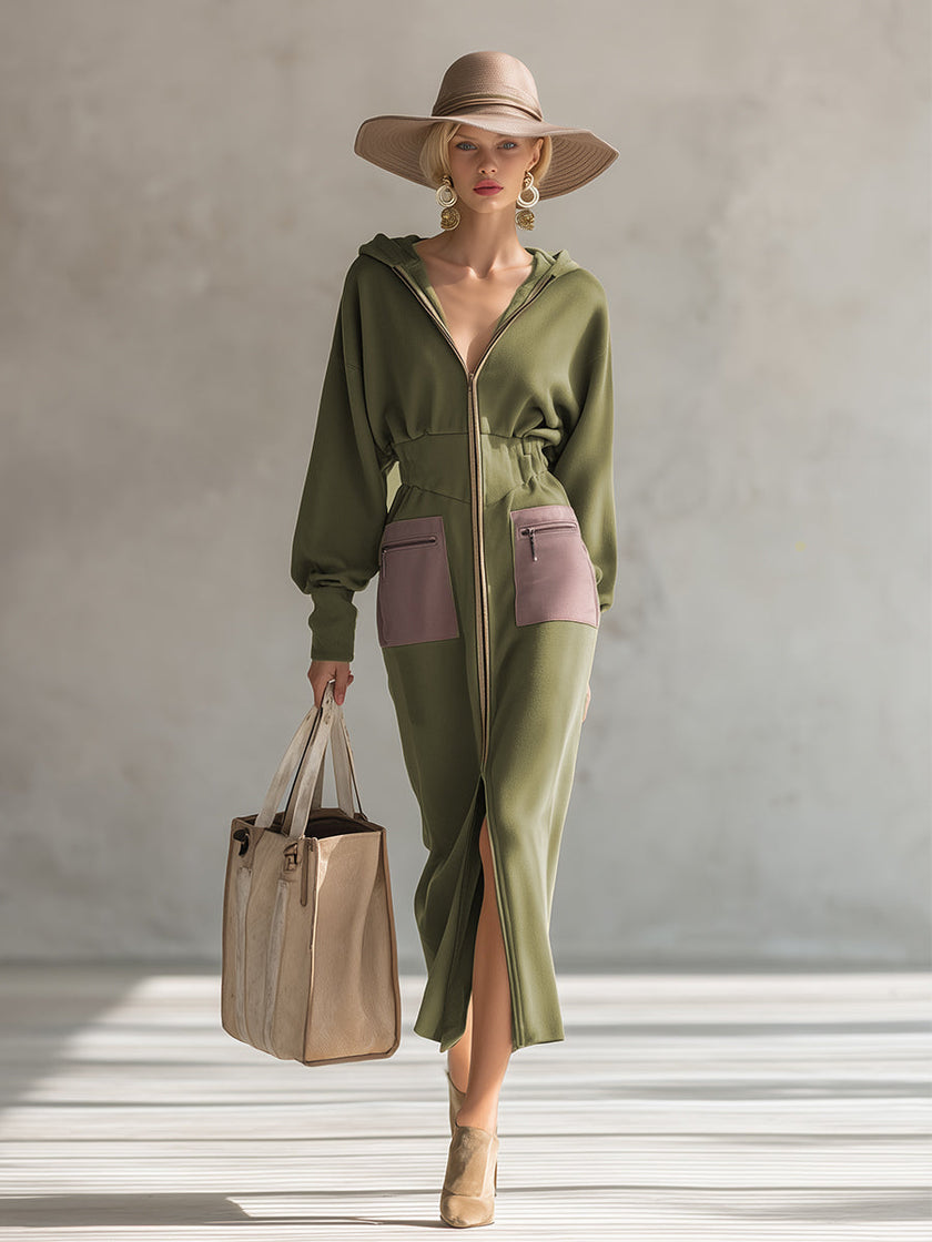 Green long sleeve maxi dress by FJØRNA, elegant evening dress with flowing fabric and fitted waist, shown on a model.