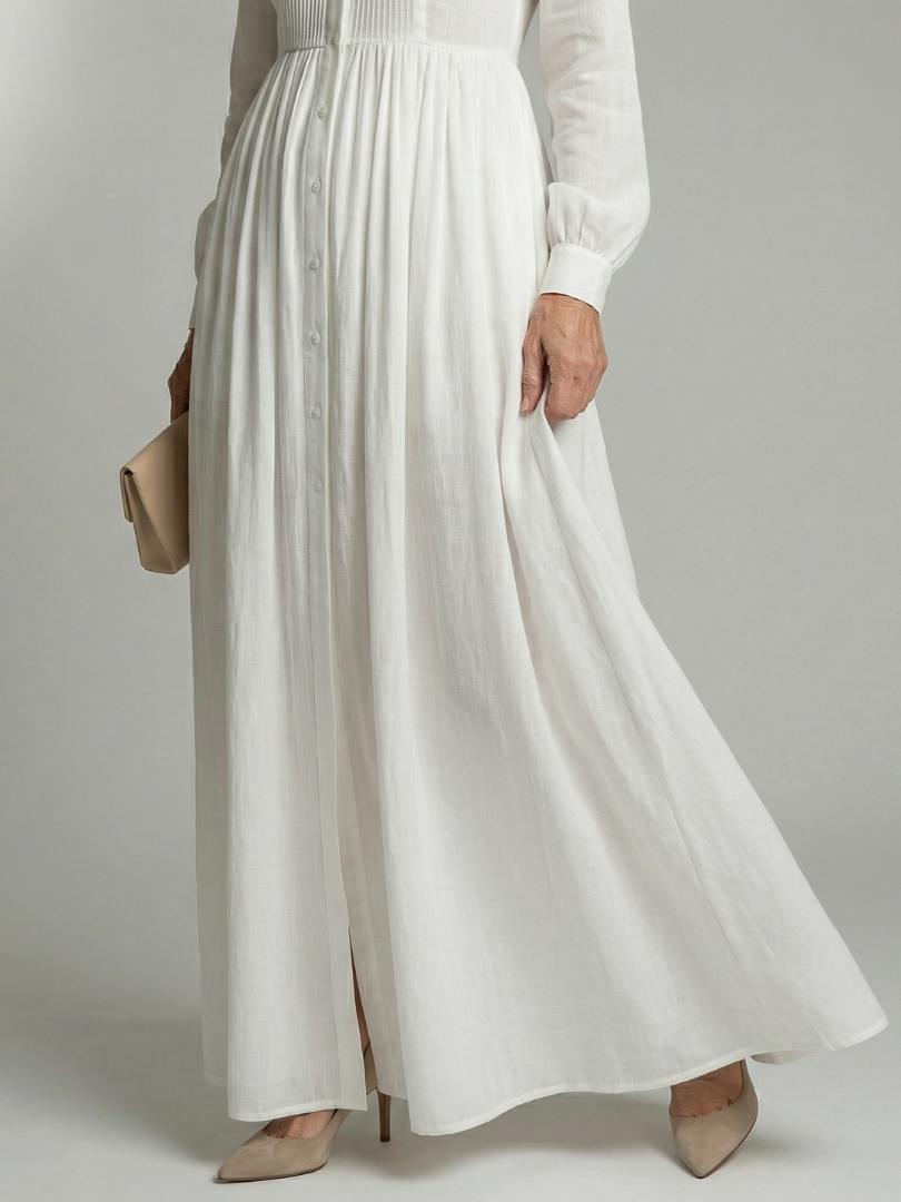 FJØRNA women's summer maxi dress with pockets, casual style, flowing fabric, and sleeveless design for warm weather.