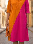 FJØRNA women's wrap summer dress with flowy fabric, stylish and comfortable for warm weather, shown in a flattering design.