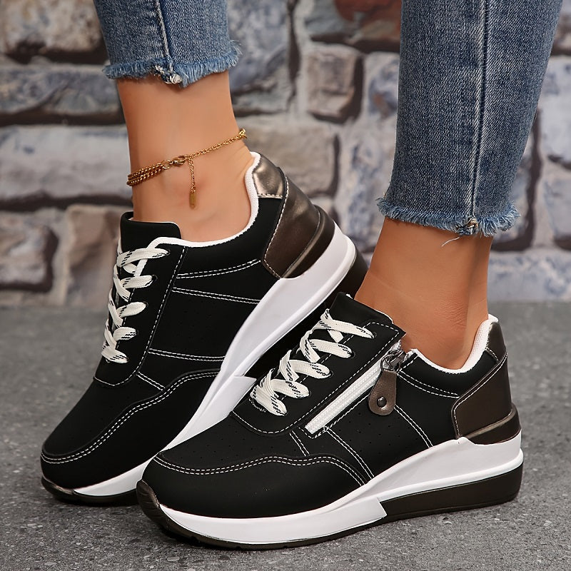 FJØRNA women's orthopedic sneakers with non-slip soles and breathable mesh upper, designed for comfort and support.