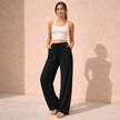 FJØRNA women’s wide-leg drawstring lounge trousers with loose fit and pull-on design, perfect for comfortable casual wear.