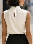 Ivory high-neck sleeveless satin blouse for women by FJØRNA, featuring a elegant white top with a fitted design.