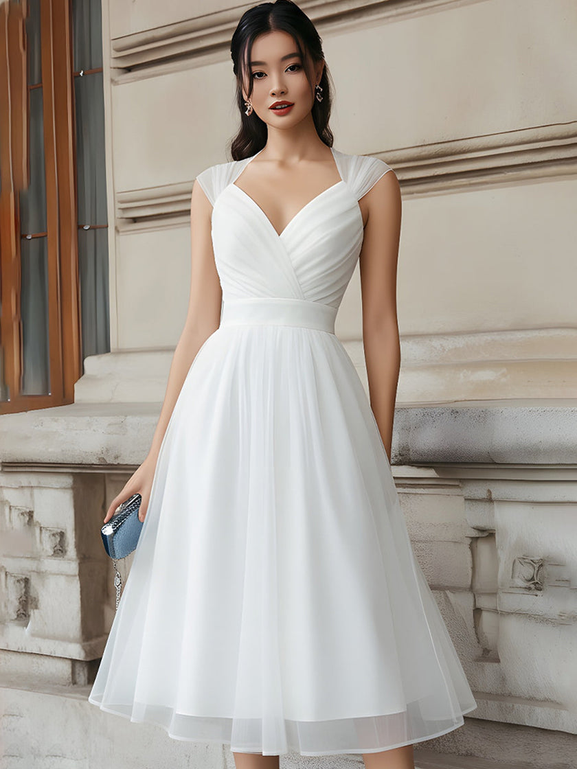FJØRNA V-neck pleated midi dress with cap sleeves, flowing fabric, and elegant design perfect for stylish occasions.