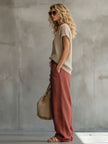 FJØRNA khaki retro short-sleeve knitted T-shirt for women with a relaxed fit and textured fabric.