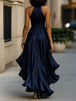 Navy satin halter ruffle gown by FJØRNA featuring elegant ruffles and a sleek satin finish, perfect for formal black tie events.