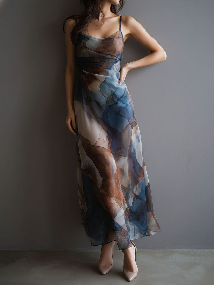 FJØRNA chiffon maxi dress for women featuring a retro style, flowy fabric, and elegant design.