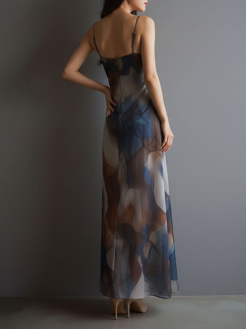 FJØRNA chiffon maxi dress for women featuring a retro design, flowing fabric, and elegant style.