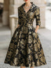 FJØRNA black and gold floral jacquard midi dress with elegant design and intricate floral patterns, perfect for formal occasions.