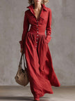 Red linen maxi dress by FJØRNA featuring a casual, flowy design perfect for warm-weather outfits.
