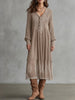 FJØRNA Whispered Snow Knit Maxi Dress, elegant occasion dress in soft knit fabric, full-length with a flowing silhouette.