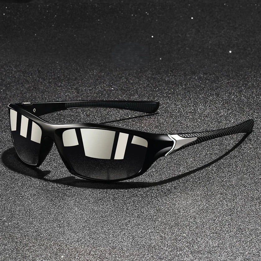 FJØRNA men's polarized wraparound UV400 sports sunglasses with sleek black frames and tinted lenses for outdoor activities.