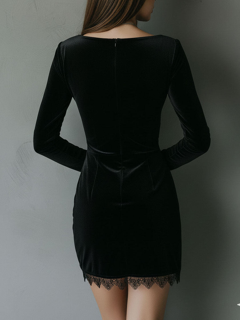 Black velvet V-neck mini dress by FJØRNA, stylish evening dress with a fitted silhouette and elegant V-neckline.