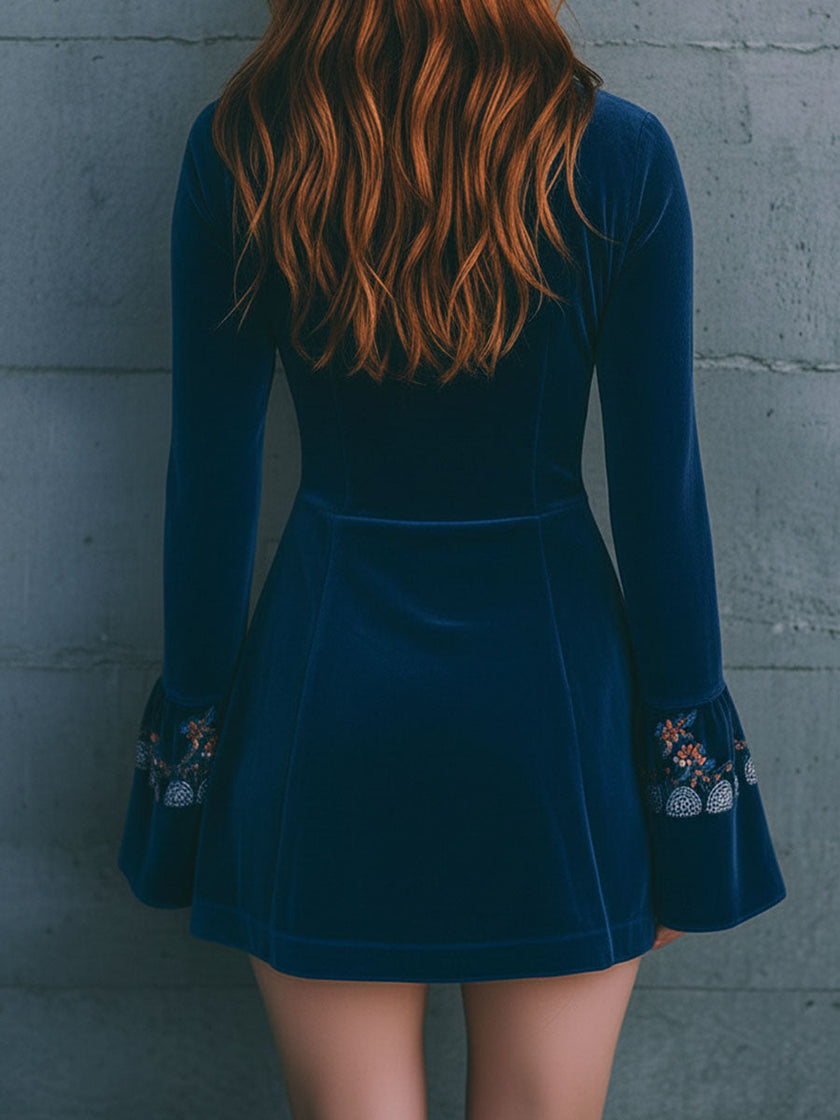 Blue velvet embroidered mini dress by FJØRNA featuring casual style, short length, and intricate embroidery details.