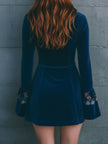 Blue velvet embroidered mini dress by FJØRNA featuring a casual style, with intricate embroidery and a fitted silhouette.
