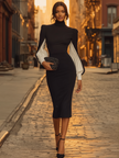 White FJØRNA midi dress for women, knee-length with a fitted waist and elegant sleeveless design, shown on a model.