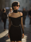 FJØRNA black mesh-panel cutout bodycon dress, a sleek cocktail dress with fitted silhouette and stylish cutout details.