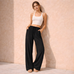 FJØRNA women's wide-leg drawstring lounge trousers with a loose fit, pull-on style, and comfortable casual design.