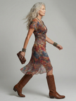 FJØRNA women's summer midi dress with halter neck and short sleeves, stylish and lightweight for warm weather.