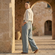 FJØRNA high waist wide leg white women's trousers, stylish pants with a relaxed fit and flowy wide legs, full length.