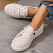 FJØRNA women's orthopedic sneakers in leather and mesh with supportive sole, designed for comfort and style.