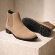 FJØRNA black slip-on Chelsea boots for men, stylish leather shoes with elastic side panels and sleek design.