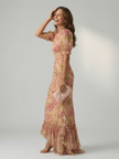 FJØRNA women's summer maxi dress with high neck and puff sleeves, flowing fabric, perfect for warm weather and casual occasions.