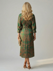 FJØRNA women's summer midi dress with long sleeves, wrap design, flowy fabric, perfect for warm-weather styling.