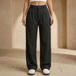 FJØRNA women's pinstripe high-waisted wide-leg trousers, tailored pants with a relaxed fit and classic pinstripe pattern.
