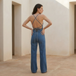 FJØRNA women's denim wide-leg jumpsuit with tie-back design, stylish and comfortable women’s set in casual denim fabric.