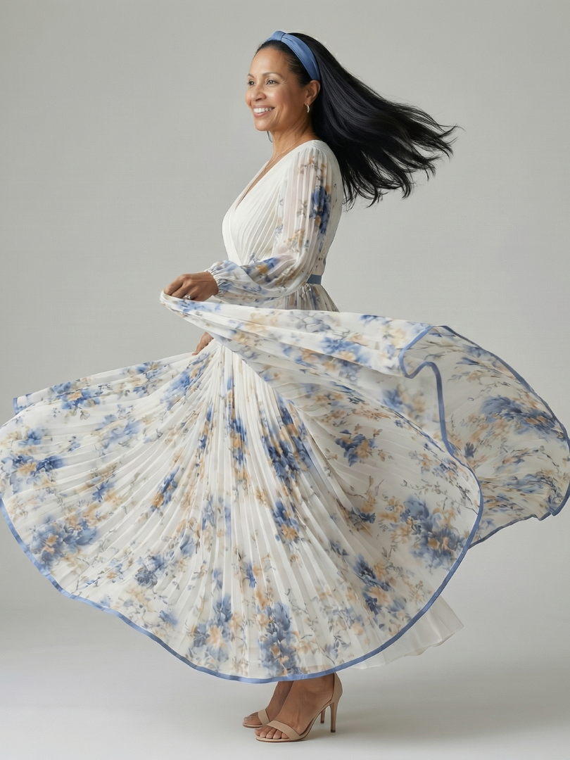 FJØRNA women’s floral midi dress with V-neck and long sleeves, perfect for summer, featuring a lightweight, flowy fabric and vibrant pattern.