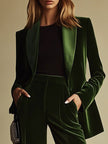 Emerald green velvet two-piece suit set for women, featuring loose pants and a matching top from FJØRNA.