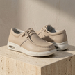 Men's red leather orthopedic walking shoes by FJØRNA with cushioned soles and supportive design for comfort and stability.