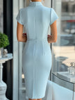 Sky blue FJØRNA asymmetric belted cocktail dress with a stylish design, perfect for elegant occasions.
