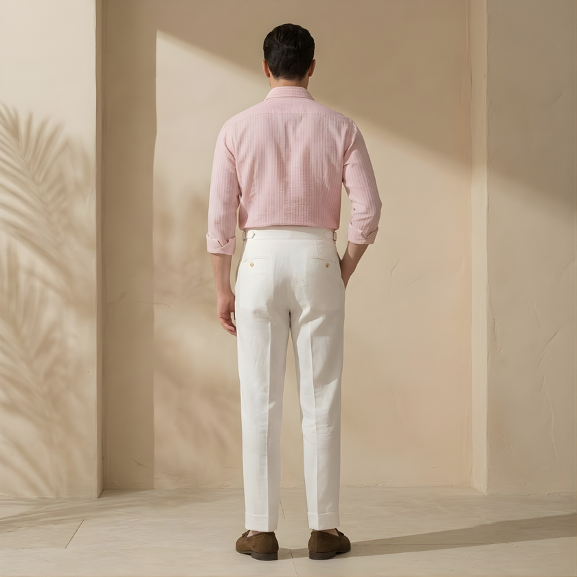 FJØRNA men's linen pleated straight-leg trousers, tailored pants with a relaxed fit and crisp pleats, in light natural linen fabric.