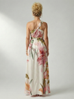 FJØRNA women's floral summer maxi dress with halter neck and sleeveless design, perfect for warm weather and outdoor occasions.