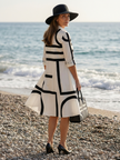 Flowy geometric wrap summer dress for women by FJØRNA, featuring a stylish and comfortable design.
