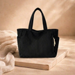 Large corduroy tote bag for women by FJØRNA, stylish everyday shoulder bag with spacious design and durable corduroy fabric.