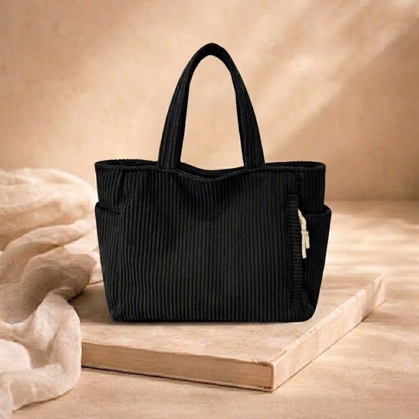 Large corduroy tote bag for women by FJØRNA, stylish everyday shoulder bag with spacious design and durable corduroy fabric.