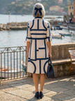 FJØRNA women's summer dress with geometric pockets, lightweight fabric, and a stylish casual design for warm weather.